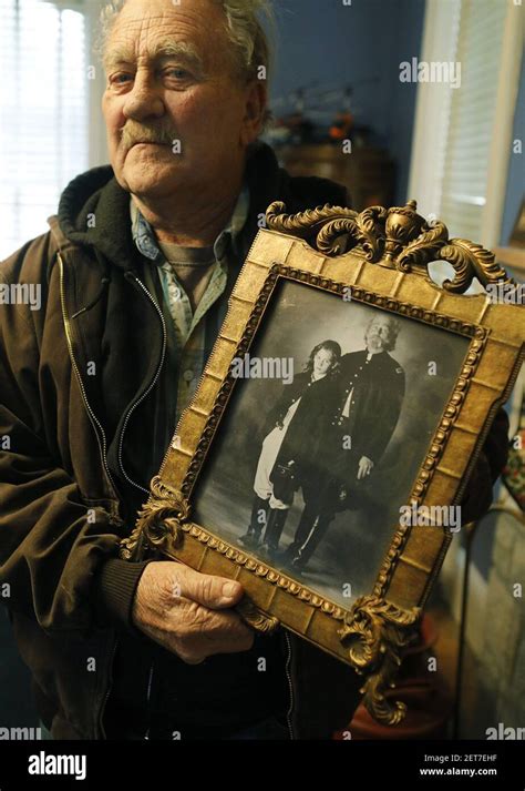 Terry Crowder Shows Off A Picture Of Himself With His Son Zachary