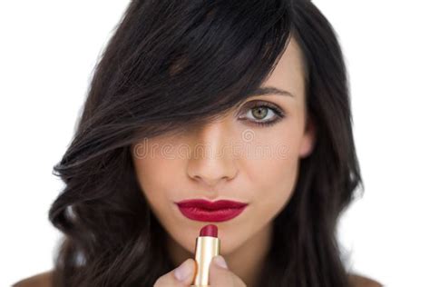 Glamorous Brunette Applying Red Lipstick Stock Image Image Of Beauty