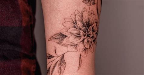 Chrysanthemum Tattoo Located On The Wrist Illustrative