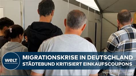 MIGRANTEN IN DEUTSCHLAND Kritik vom Städtebund Einkaufscoupons für