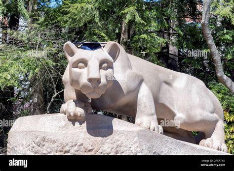 Nittany Lion in the academic cap in the campus of Penn State University ...