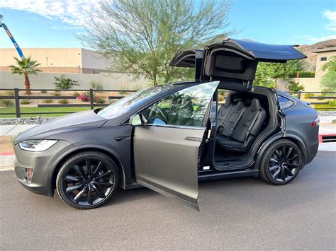 Tesla Model X Black Satin Gold Dust Vinyl Wrap With Carbon Fiber