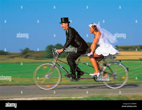 Two Women On Tandem Bicycle Hi Res Stock Photography And Images Alamy