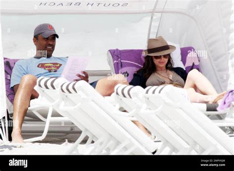 Eliza Dushku Appears To Be Having Some Bikini Problems As She Relaxes