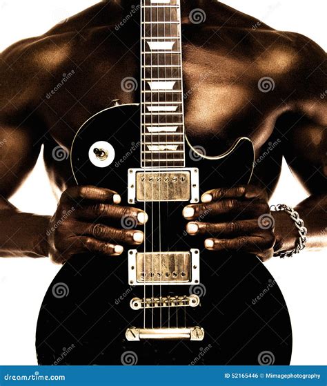 African American Shirtless Man Holding Electric Guitar Stock Photo