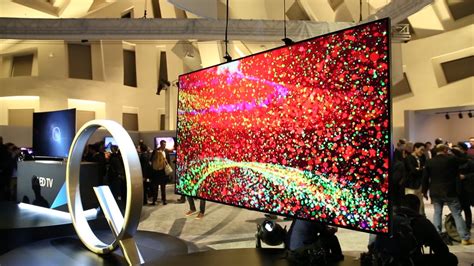 Samsung Qled Tvs Use Quantum Dots To Battle Lgs Oleds Video Cnet