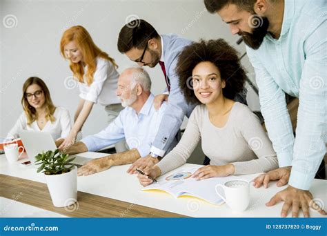 Joyful Multiracial Business Team At Work In Modern Office Stock Photo