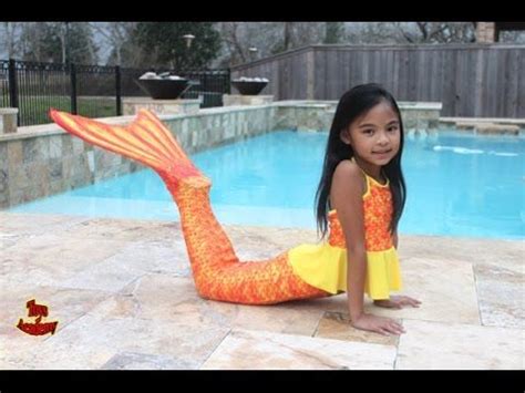 Swimming in a Silicone Mermaid Tail | Purple Rainbow Tails - YouTube ...