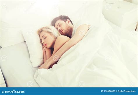 Happy Couple Sleeping in Bed at Home Stock Photo - Image of family ...