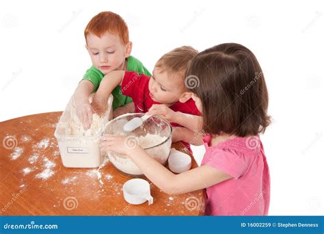 Preschooler Kids Making Mess In Kitchen Royalty Free Stock Images