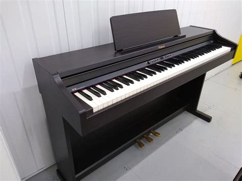 Roland RP301 Digital Piano in rosewood Full Size 88 weighted keys, 3 p ...