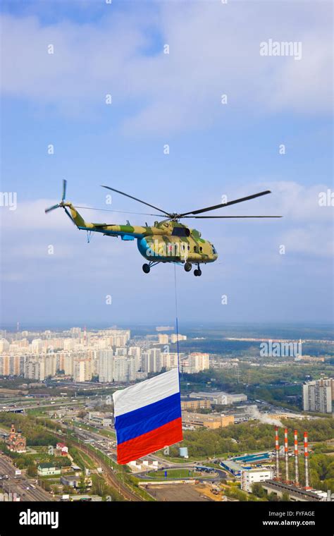 Helicopter With Russian Flag Over Moscow At Parade Of Victory Day Stock