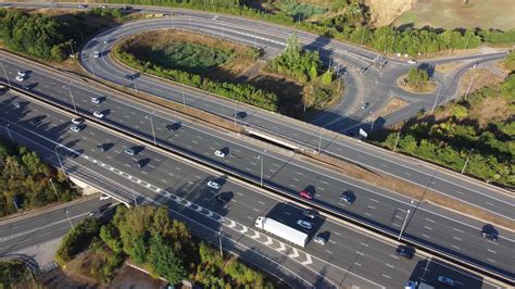 Aerial view of Busy Motorways with Traffic at England UK. 10826386 ...