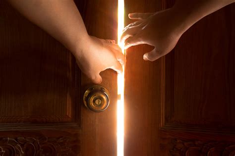 Use Your Hand To Open The Door To The Light Stock Photo Download