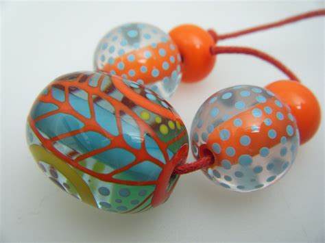 Moogin Beads Oval Focal Bead Set Abstract Coral With Blue Core