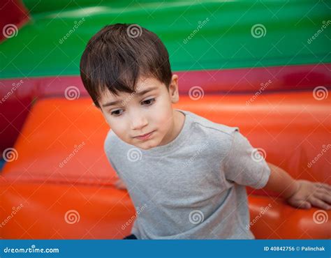 Menino No Campo De Jogos Foto De Stock Imagem De Felicidade 40842756