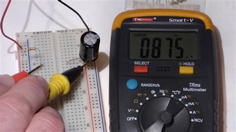 Multimeter Measurements Of Voltage And Current Of Slowly Charging