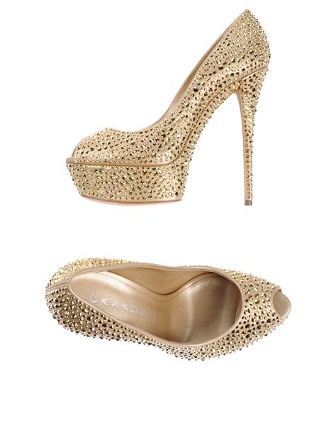 Casadei Pumps With Open Toe In Gold Lyst