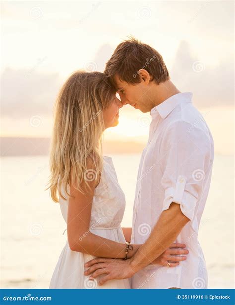 Happy Romantic Couple Having Loving Moment Touching Foreheads Stock