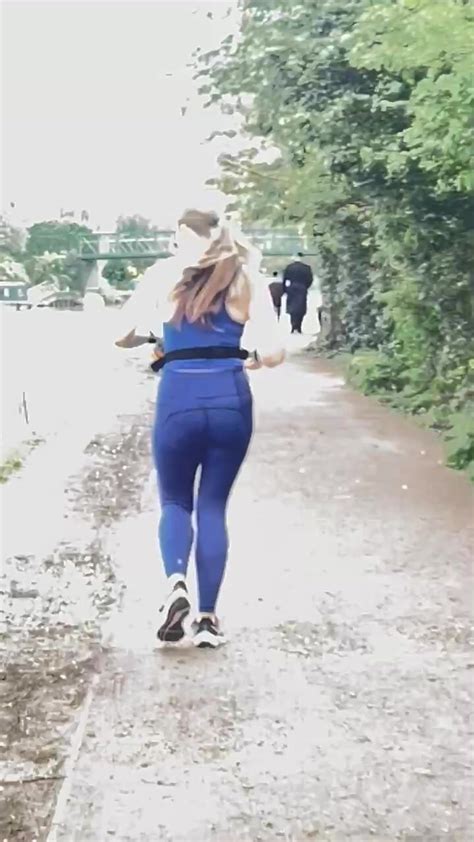 Brunette Running In Blue Yoga Pants ThisVid