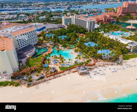 The Coral Hotel At Atlantis Resort Aerial View With Nassau Downtown At The Background On