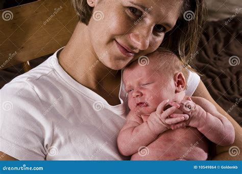 Mother Cradling Newborn Stock Photo Image Of Camera 10549864