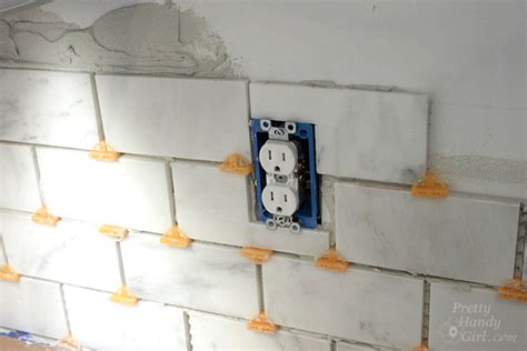 How To Install Kitchen Backsplash Tile Around Outlets Things In The