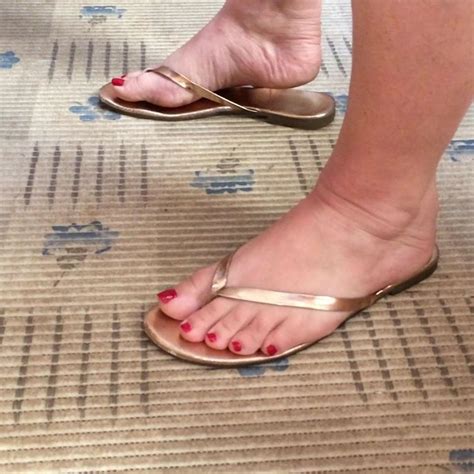 Sexy Feet With Red Toenails And Gold Thong Sandals Porn Xhamster