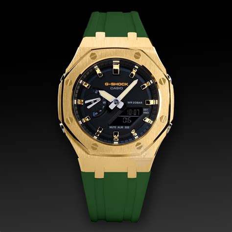 G Shock Mod With Yellow Gold Steel Case Green Strap And Yellow Gold Hour Markers Item Sp189