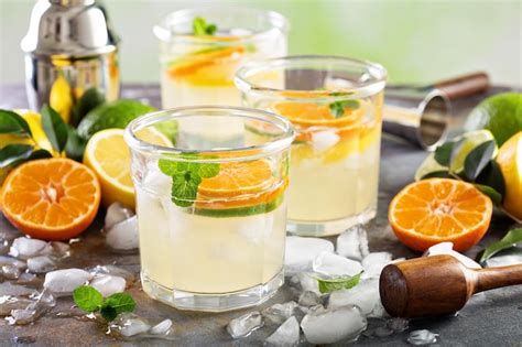 Premium Photo Refreshing Summer Cocktail With Citrus Fruits