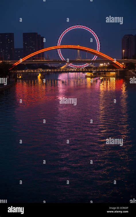 Tianjin Eye at night, China Stock Photo - Alamy