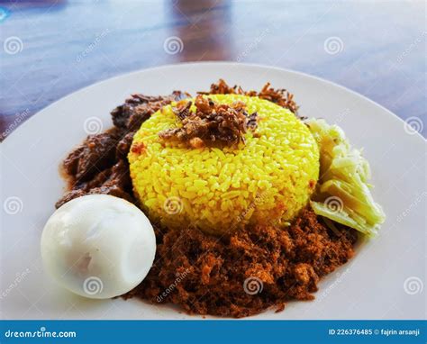 Nasi Kuning, Traditional Food of South Sulawesi, Indonesia. Stock Image - Image of sulawesi ...