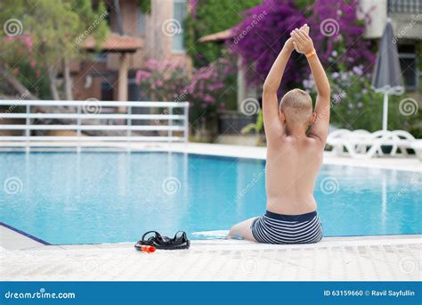 A Cute Blonde Boy Learning To Swim Stock Photo Image Of Summer Activity