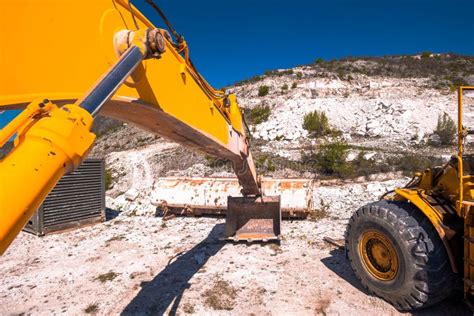 Yellow Excavator Digging On Mountain Stock Image Image Of Build Blue