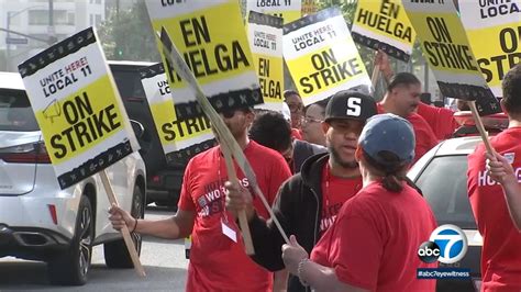 Hundreds of striking hotel workers take to the streets of downtown LA ...