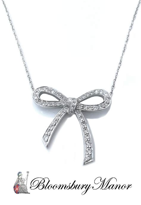 Tiffany And Co 027ct Diamond And Platinum Bow Pendant Necklace Rrp £3