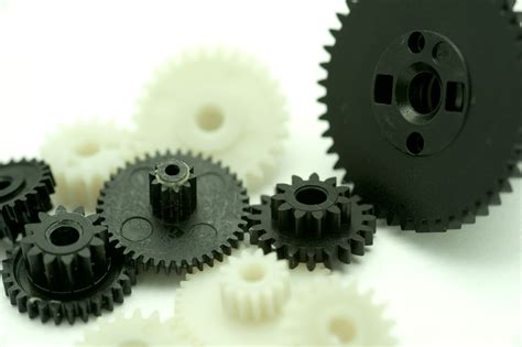 Free Image of Close up Plastic Black and White Gear Wheels | Freebie ...