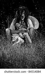 Horror Scene Woman Possessed Holding Doll Stock Photo 84514084