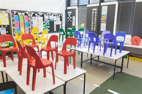 Premium Photo Chairs Arranged On Table In Empty Classroom