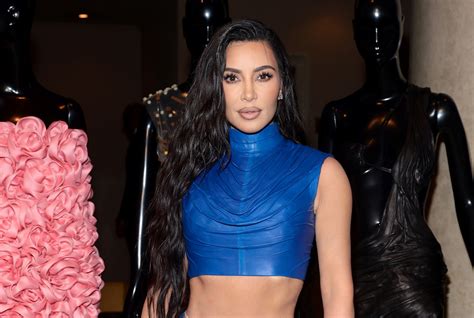 Kim Kardashian Shows Off Her Abs In Blue Balmain Two Piece