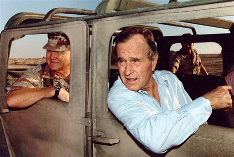 Norman Schwarzkopf, Jr. and President George H. W. Bush visiting troops ...