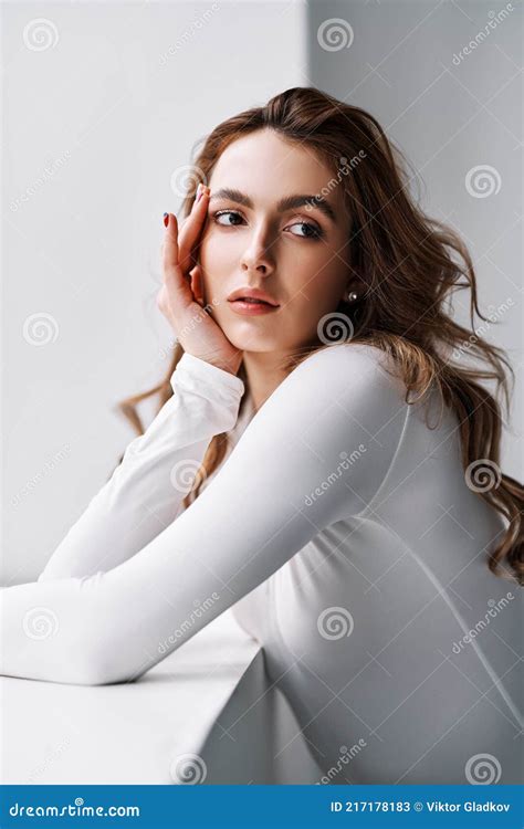 Close Up Portrait Of Sensual Pretty Young Woman In White Clothes Stock