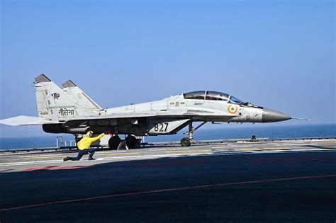 MIG-29 of indian airforce on india's indigenous aircraft carrier ins ...