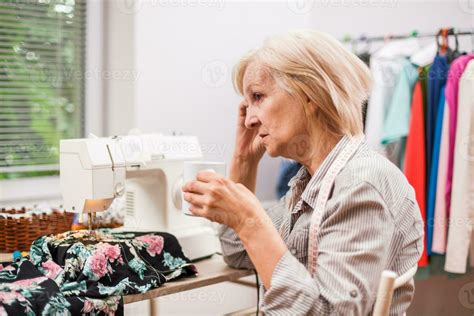 A woman tailoring 23919320 Stock Photo at Vecteezy