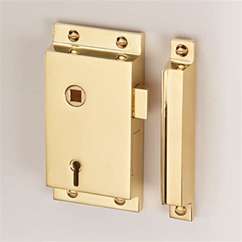 Flanged Upright Rim Lock Left Hand Polished Brass Unlacquered