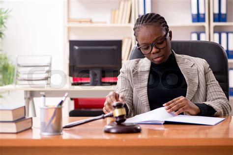 Black female lawyer in courthouse | Stock image | Colourbox