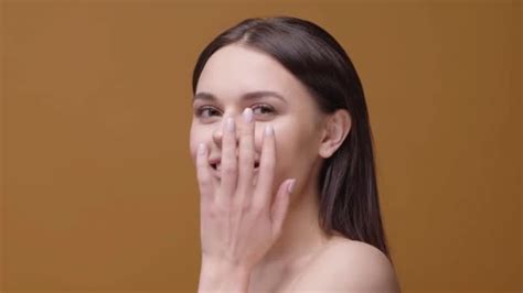 Girl Gently Rubs Her Face Her Hands Enjoying Process Skin — Stock Video