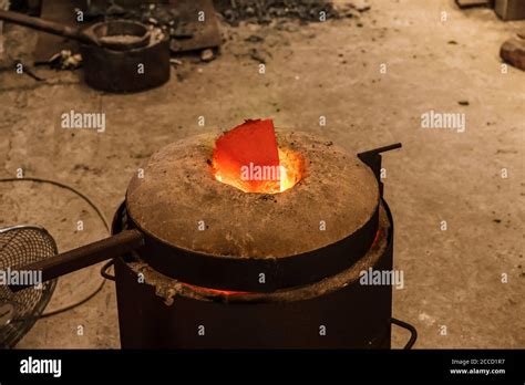 Casting The Bronze In Small Foundry Sequence Of Images Shows