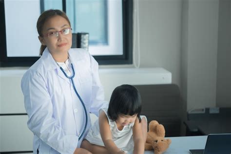 Premium Photo Asian Doctor Using A Stethoscope To Check His Breathing