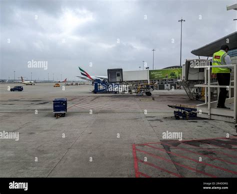 An airport scene with planes on the runway Stock Photo - Alamy